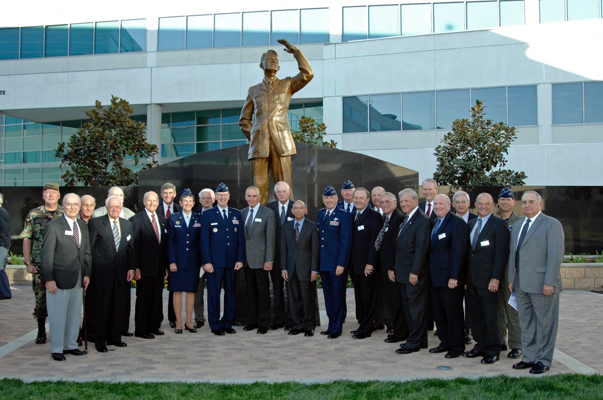 A galaxy of stars, current and past, stand in front of the Schriever Memorial and Wall of Honor after a dedication ceremony Nov. 15, 2007. Included in this group portrait, left to right: Brig. Gen. Bradley, Maj. Gen. Cooper, Brig. Gen. King, Lt. Gen. Henry,Ukn, Maj. Gen. Funk, Maj. Gen. Sega, Lt. Gen. Pawlikowski, Maj. Gen. Tourino, Gen. Kehler, Gen. Kutyna, Lt. Gen. Barry, Gen. Randolph, Lt. Gen. Hamel, Maj. Gen. Deppe, Brig. Gen. Kwiatkowski, Brig. Gen. Dudzik, Brig. Gen. Coglitore, Maj. Gen. Clark, Lt. Gen. Arnold, Maj. Gen. Taverney, Brig. Gen. Schlitt, Maj. Gen. Hard, Lt. Gen. Sheridan, Lt. Gen. Tattini .(U.S. Air Force photo)