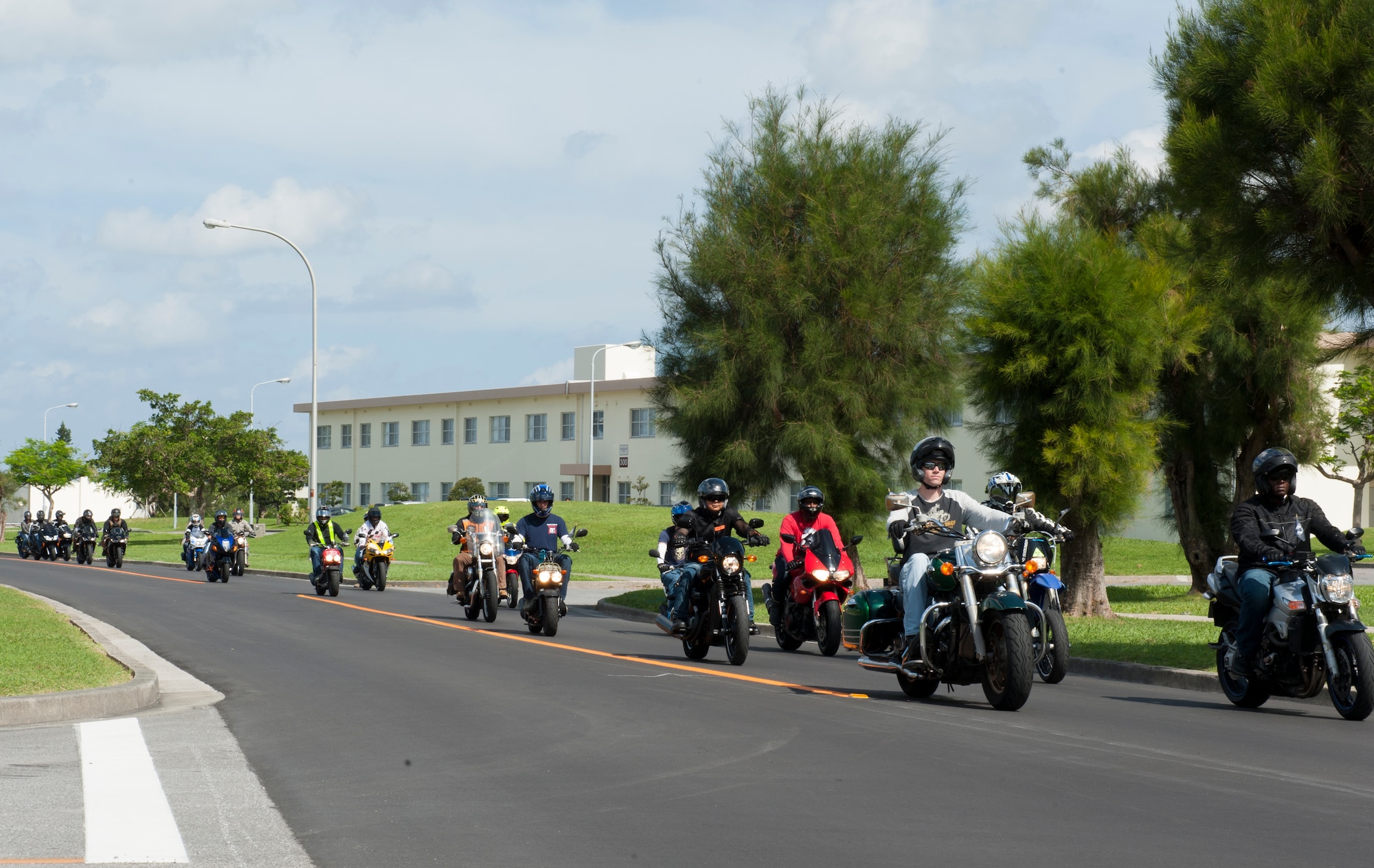 A group of riders begin their journey for the Prisoner of War/Missing in Action memorial ride on Kadena Air Base, Japan, Sept. 18, 2015. The POW/MIA memorial ride is a common annual event across the United States and U.S. Armed Forces installations around the world. More than 30 riders at Kadena participated in this year’s event.  (U.S. Air Force photo by Airman 1st Class Zackary A. Henry)