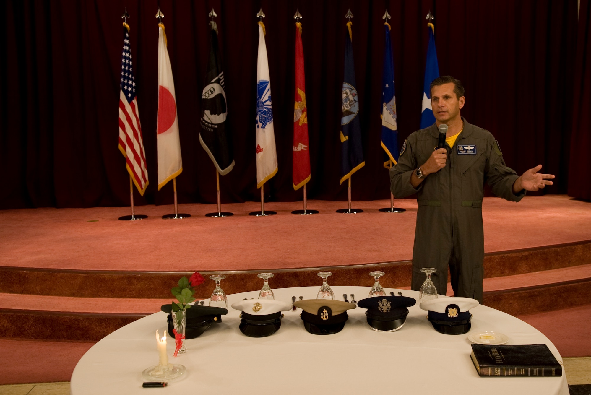 Brig. General Barry Cornish, 18th Wing commander, delivers the Prisoner of War/Missing in Action breakfast closing remarks, Sept. 18, 2015, at the Kadena’s Officer’s Club, Kadena Air Base Japan. The breakfast was held in remembrance of the fallen that never returned home or became prisoners of war. (US Air Force photo by Airman 1st Class Nicholas Emerick)