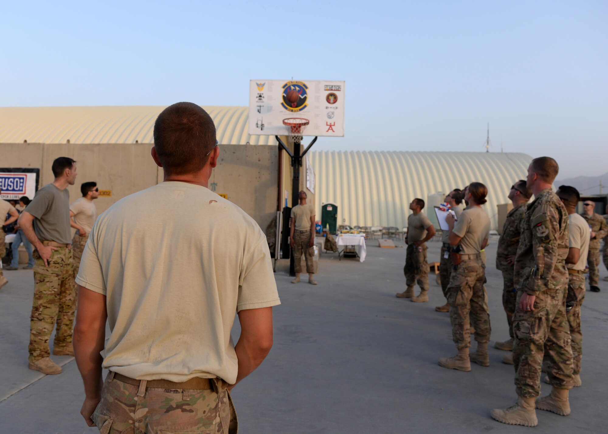 U.S. Airmen assigned to the 455th Air Expeditionary Wing participate in a three point shootout contest during an Air Force birthday celebration Sept. 18, 2015, at Bagram Airfield, Afghanistan. The block party which was hosted by the Armed Forces Committed to Excellence council, the 455th Force Support Squadron and other private organizations featured games, food and a traditional AF cake cutting ceremony. (U.S. Air Force photo by Senior Airman Cierra Presentado/Released)