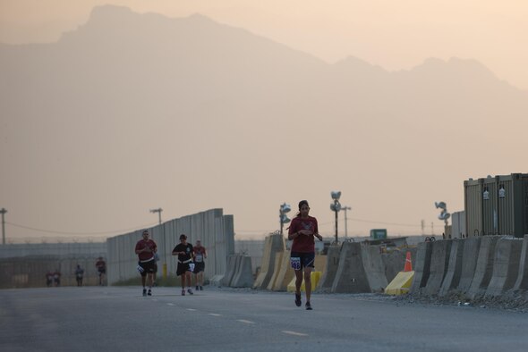 U.S. Service members run during the Air Force Half Marathon event at Bagram Airfield, Afghanistan, Sept. 19, 2015. This year marked the 7th year that the AF has sanctioned deployed location races overseas. (U.S. Air Force photo by Tech. Sgt. Joseph Swafford/Released)