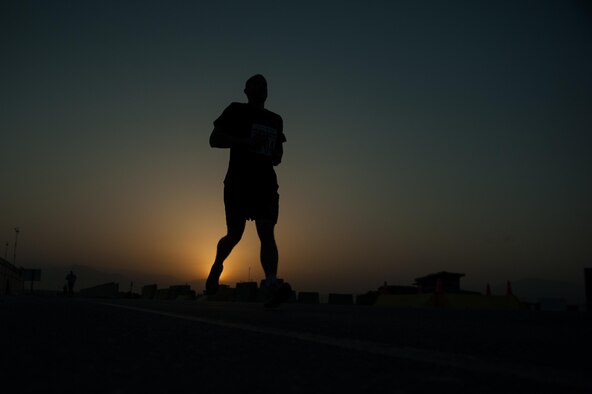 A U.S. Service member runs during the Air Force Half Marathon event at Bagram Airfield, Afghanistan, Sept. 19, 2015. This year marked the 7th year that the AF has sanctioned deployed location races overseas. (U.S. Air Force photo by Tech. Sgt. Joseph Swafford/Released)