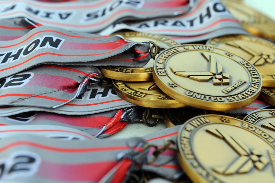 The 386th Expeditionary Force Support Squadron hosted the Air Force Marathon at a deployed location in Southwest Asia, Sept. 19, 2015. Race participants received medals after completing half marathon and 10K races. (U.S. Air Force photo/Tech. Sgt. Brittany E. Jones)