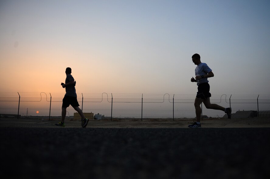 Runners deployed in support of Operation Inherent Resolve participate in the Air Force Half Marathon at a deployed location in Southwest Asia, Sept. 19, 2015. In 2015, 1,950 athletes registered to run the marathon at deployed locations overseas. (U.S. Air Force photo/Tech. Sgt. Brittany E. Jones)