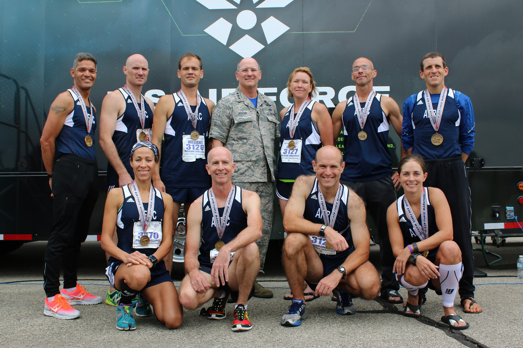 WRIGHT-PATTERSON AIR FORCE BASE - Ohio
The Air Force Reserve Command MAJCOM Challenge Team poses with Lt. Gen. James Jackson, commander, Air Force Reserve Command after completing the Air Force Marathon Sept. 19, 2015. The team consisted of traditional reservists, air reserve technicians, individual mobilization augmentees and Air Guard Reserve members. The MAJCOM challenge included six Airmen participating in the half marathon and four in the full marathon. 