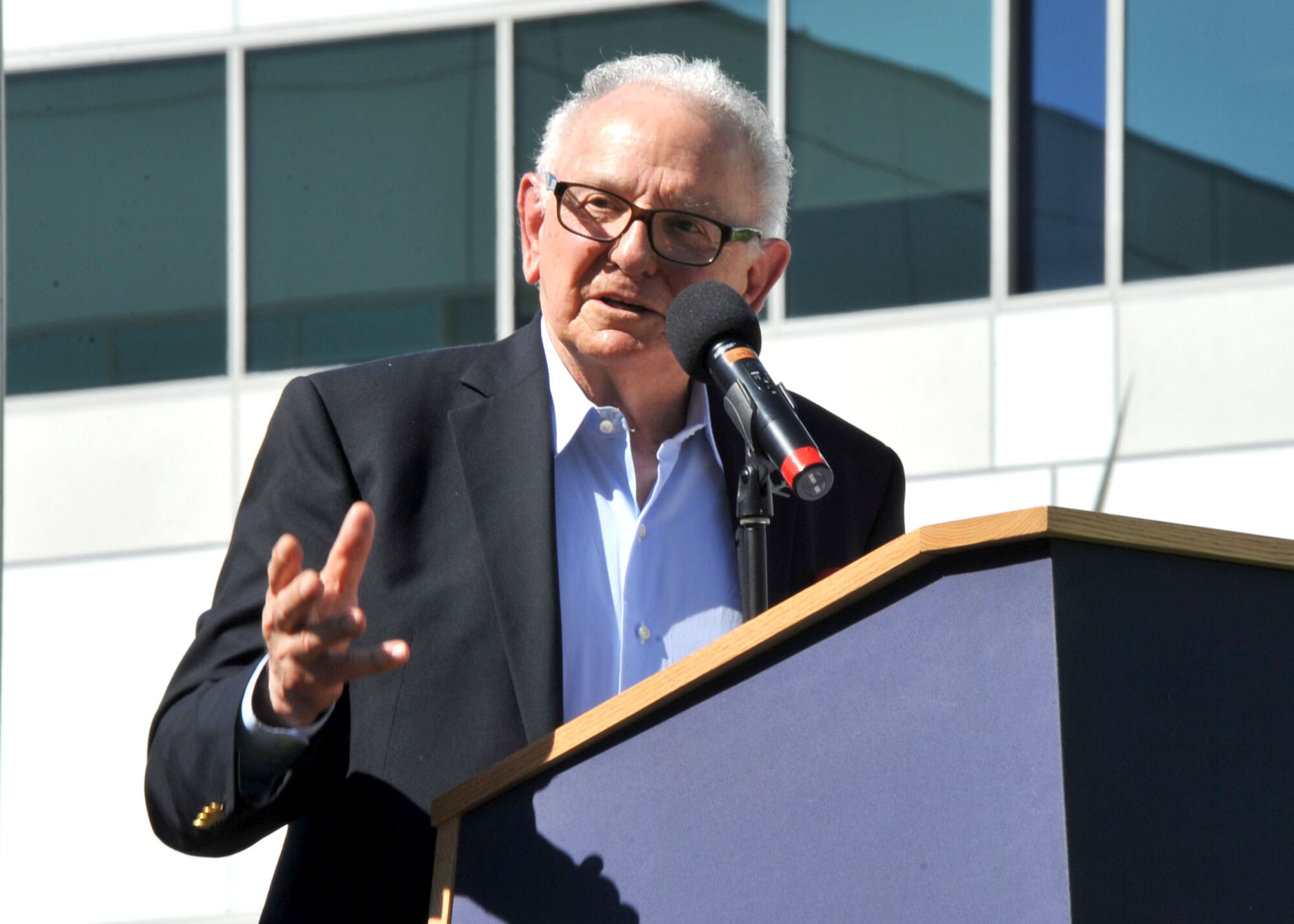 Honored guest and retired Air Force Col. Ken Hughey, an F-4 Phantom pilot shot down over North Vietnam in July 1967 and held as a POW until his release in 1973 addresses the audience during the National POW/MIA Recognition Day ceremony Sept. 18 at the Space and Missile Systems Center's Schriever Space Complex flagpole at Los Angeles Air Force Base in El Segundo, Calif. (U.S. Air Force photo/Sarah Corrice)