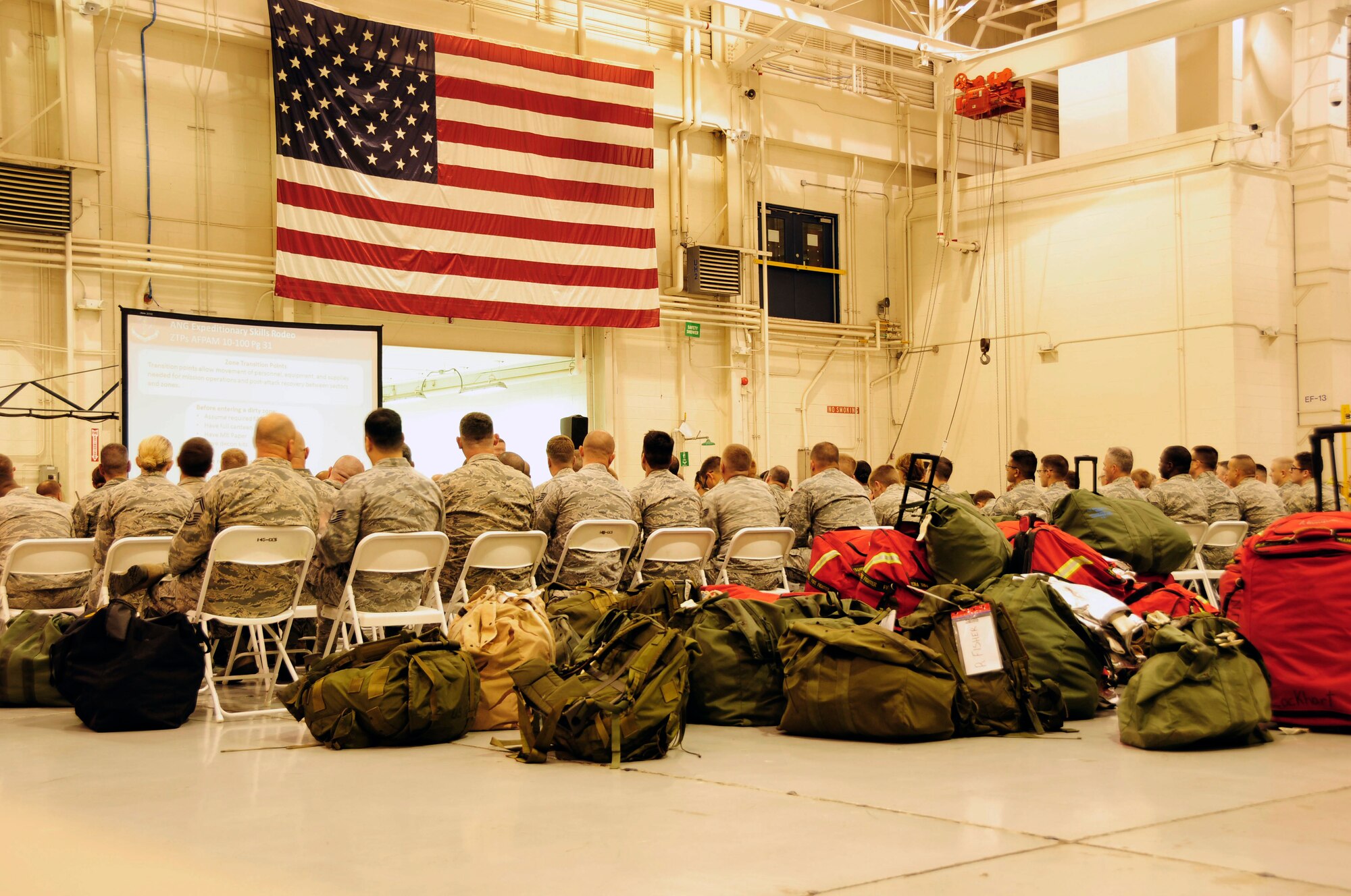 More than 100 Airmen gathered inside a hanger at the North Carolina Air National Guard Base, Charlotte Douglas International Airport, to receive hands-on chemical, biological, radiological and nuclear training along with self-aid buddy care during the 145th Airlift Wing’s Air Expeditionary Skills Rodeo training, Sept. 13, 2015. This training is used by Airmen who are deploying or preparing for inspections. These skills make up the foundation necessary for all Airmen to function effectively in non-conventional hostile environments. (U.S. Air National Guard photo by Master Sgt. Patricia F. Moran, 145th Public Affairs/Released)