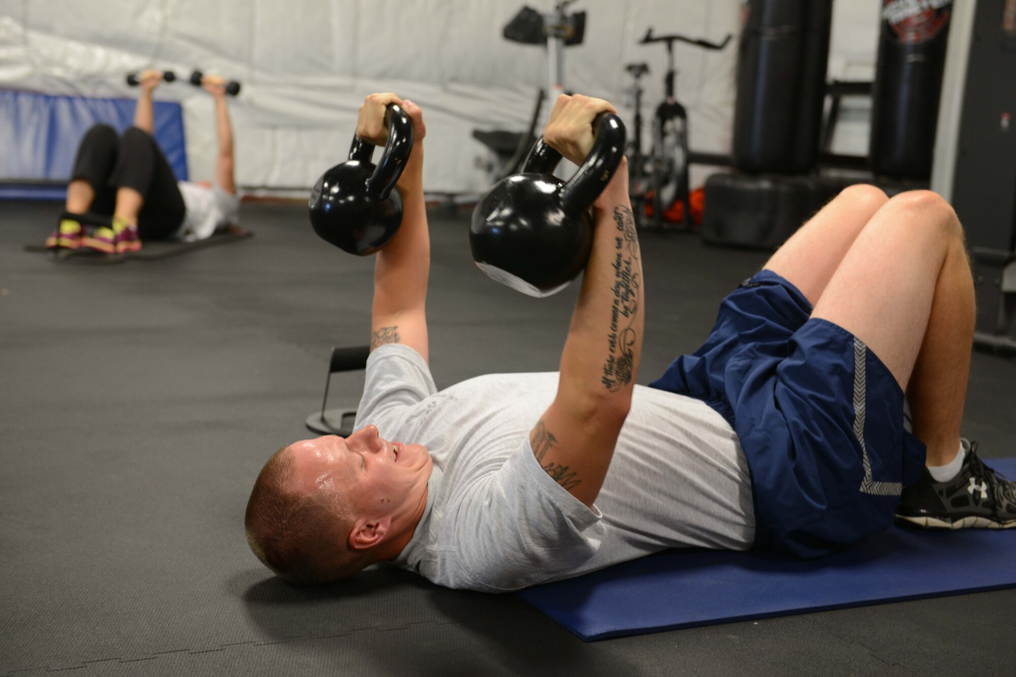 A physical fitnessl training class is held at the base gym during drill weekend at 132d Wing on Sunday, August 2, 2015. 2nd   (U.S. Air National Guard photo by Tech. Sgt. Michael B. McGhee/Released)