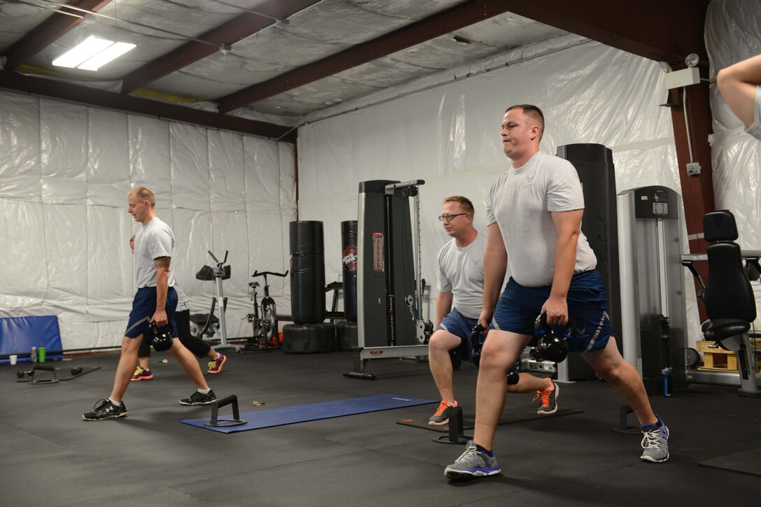 A physical fitness training class is held at the base gym during drill weekend at 132d Wing on Sunday, August 2, 2015.  (U.S. Air National Guard photo by Tech. Sgt. Michael B. McGhee/Released)