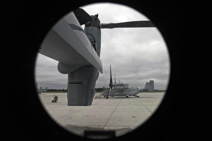 MV-22B Ospreys assigned to Marine Medium Tiltrotor Squadron (VMM) 365, are positioned in preparation for parachute exercises at Marine Corps Air Station New River, N.C., Sept. 1, 2015. VMM-365 transported Marines assigned to Marine Raider Regiment as they conducted the exercises.