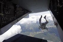 A U.S. Marine with Marine Raider Regiment, conducts  a free-fall jump from the back of an MV-22B Osprey assigned to Marine Medium Tiltrotor Squadron 265 (VMM), during parachute exercises above drop zone Pheasant, N.C., Sept. 1, 2015. VMM-365 transported Marines assigned to Marine Raider Regiment as they conducted the exercises.