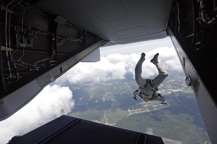 A U.S. Marine with Marine Raider Regiment, conducts  a free-fall jump from the back of an MV-22B Osprey assigned to Marine Medium Tiltrotor Squadron 265 (VMM), during parachute exercises above drop zone Pheasant, N.C., Sept. 1, 2015. VMM-365 transported Marines assigned to Marine Raider Regiment as they conducted the exercises.