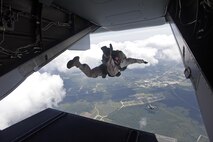 U.S. Marines with Marine Raider Regiment, conduct a free-fall jump from the back of an MV-22B Osprey assigned to Marine Medium Tiltrotor Squadron 265 (VMM), during parachute exercises above drop zone Pheasant, N.C., Sept. 1, 2015. VMM-365 transported Marines assigned to Marine Raider Regiment as they conducted the exercises.