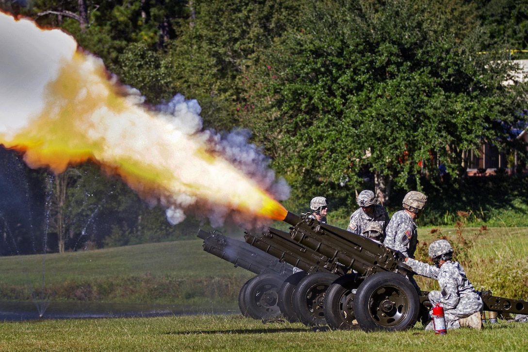 Soldiers fire three M116 pack howitzers during a change of command rehearsal for the Army Reserve’s 108th Training Command at Fort Jackson, S.C., Sept. 19, 2015. The soldiers are assigned to Troops Battalion Salute Battery, 171st Brigade. The M116's are called “pack” howitzers because they were originally pulled by pack animals. U.S. Army photo by Sgt. Ken Scar