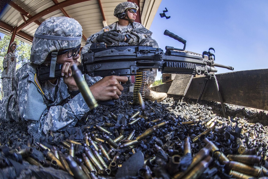 A basic combat training soldier fires the M249 squad assault weapon at the weapons range on Fort Jackson, S.C., Sept. 18, 2015. U.S. Army photo by Sgt. 1st Class Brian Hamilton