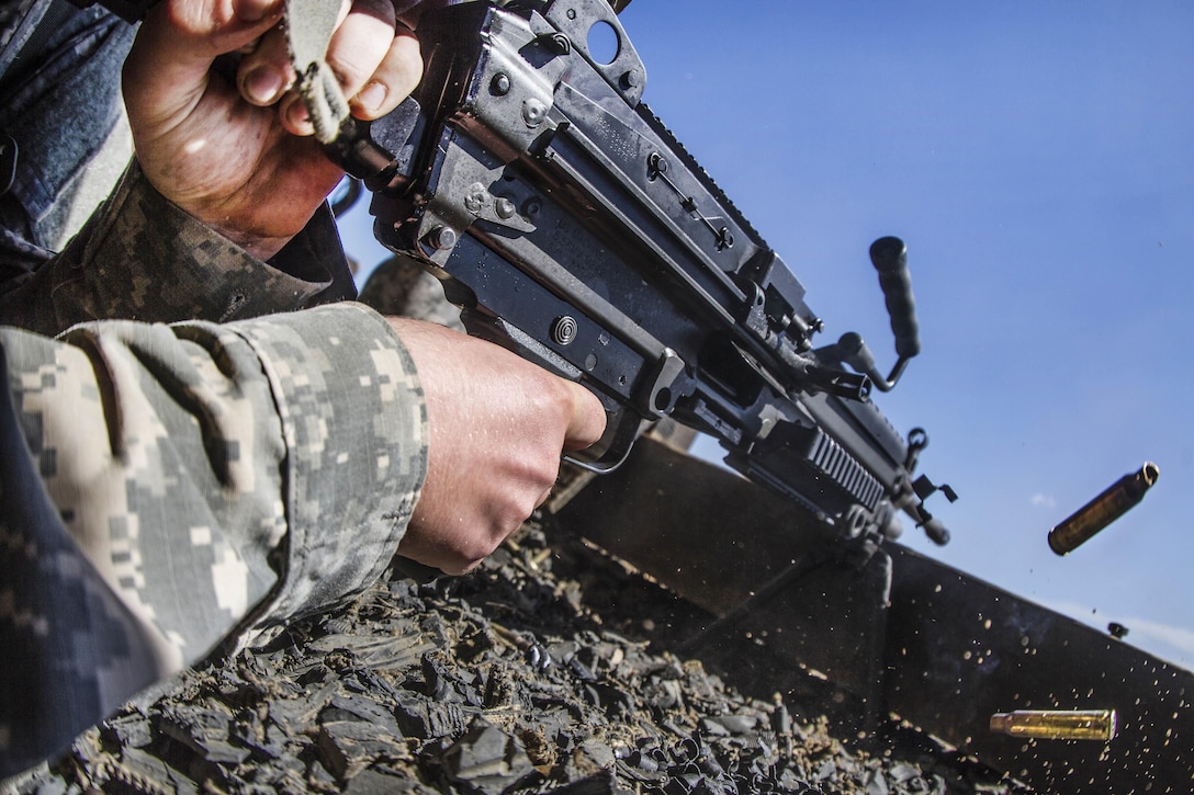 A basic combat training soldier fires the M249 squad assault weapon at the weapons range on Fort Jackson, S.C., Sept. 18, 2015. U.S. Army photo by Sgt. 1st Class Brian Hamilton