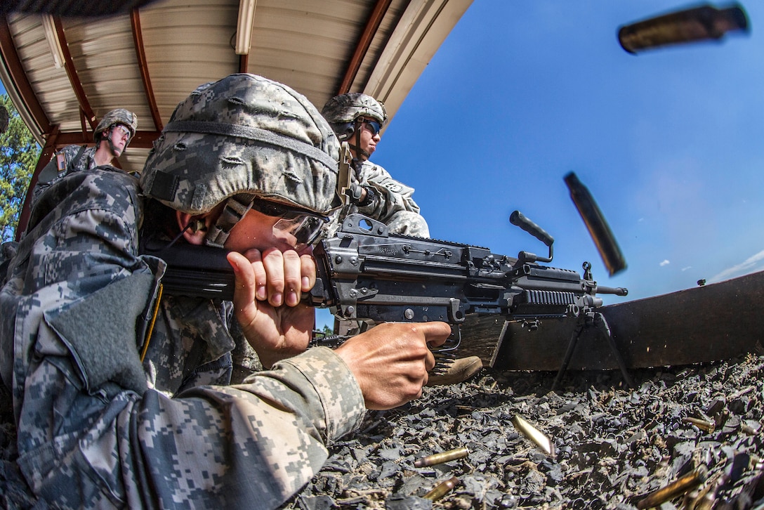 A basic combat training soldier fires the M249 squad assault weapon at the weapons range on Fort Jackson, S.C., Sept. 18, 2015. U.S. Army photo by Sgt. 1st Class Brian Hamilton