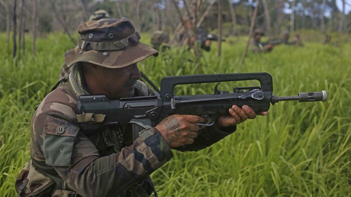 U.S. Marines with Company B, 1st Battalion, 4th Marine Regiment, Marine Rotational Force – Darwin, conduct patrol-based operations and engage in platoon-level attacks with troops from His Majesty’s Armed Forces of Tonga, the New Zealand Defence Force, the French Army of New Caledonia and the Tongan Royal Guards during their culminating event for Exercise Tafakula 15 Sept. 9-11 on Tongatapu Island, Tonga. Each military force split into integrated platoons for the event that comprised of 72 hours of patrolling, land navigation and attacking mock enemy positions. The rotational deployment of U.S. Marines in Darwin affords unprecedented combined training opportunities such as Exercise Tafakula and improves interoperability between the involved forces.