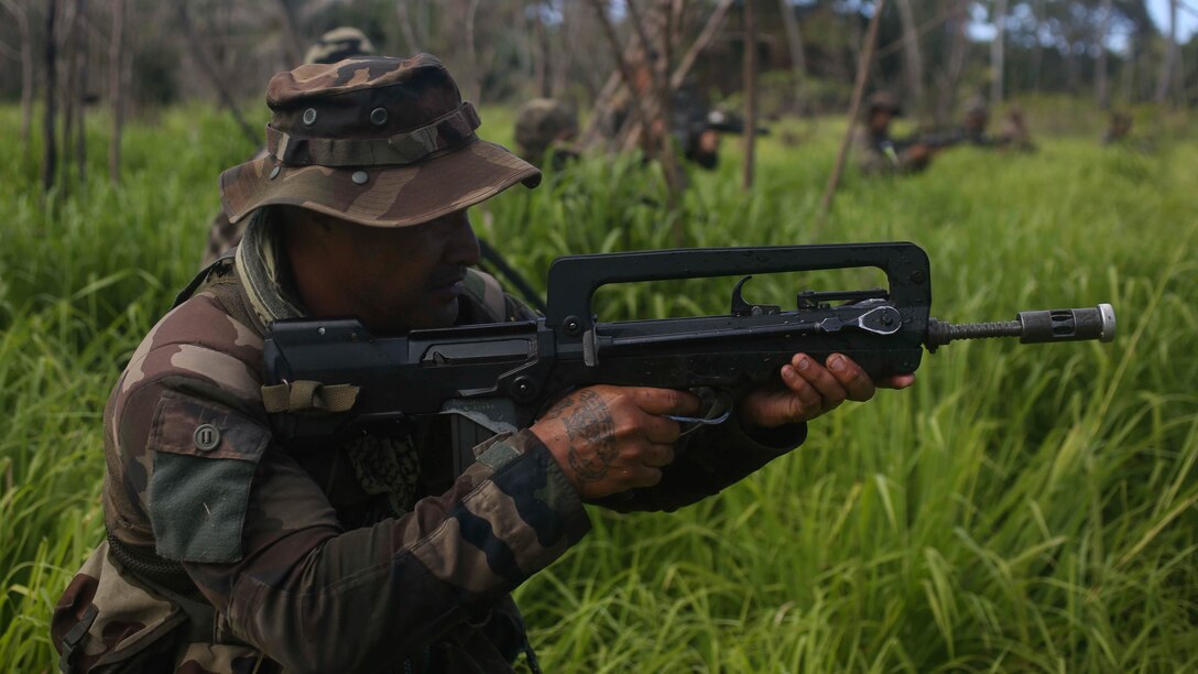 U.S. Marines with Company B, 1st Battalion, 4th Marine Regiment, Marine Rotational Force – Darwin, conduct patrol-based operations and engage in platoon-level attacks with troops from His Majesty’s Armed Forces of Tonga, the New Zealand Defence Force, the French Army of New Caledonia and the Tongan Royal Guards during their culminating event for Exercise Tafakula 15 Sept. 9-11 on Tongatapu Island, Tonga. Each military force split into integrated platoons for the event that comprised of 72 hours of patrolling, land navigation and attacking mock enemy positions. The rotational deployment of U.S. Marines in Darwin affords unprecedented combined training opportunities such as Exercise Tafakula and improves interoperability between the involved forces. 