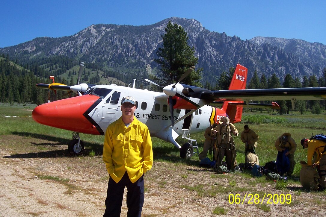 Col. Paul "Buster" Delmonte, the Emergency Preparedness Liaison Officer for Utah, is a lead plane pilot for the U.S. National Forest Service. He is pictured here with one of his aircraft, a DHC-6 Twin Otter.