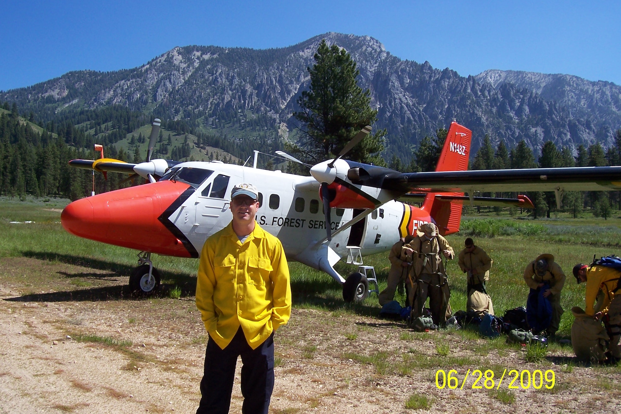 Col. Paul "Buster" Delmonte, the Emergency Preparedness Liaison Officer for Utah, is a lead plane pilot for the U.S. National Forest Service. He is pictured here with one of his aircraft, a DHC-6 Twin Otter.