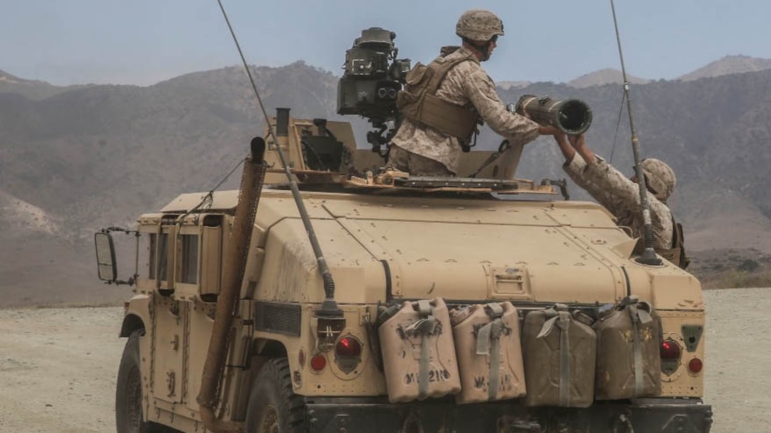 U.S. Marines with the Combined Anti-Armor Team (CAAT) within Battalion Landing Team (BLT) 2/1, the ground combat element for the 13th Marine Expeditionary Unit, practice loading and unloading rounds during sustainment training on Aug. 21, 2015. The CAAT, composed of heavy machine gunners and anti-tank missilemen, is used to combat hardened targets as well as provide security. 