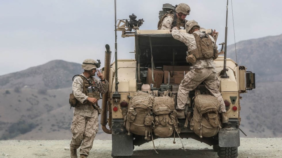 U.S. Marines with the Combined Anti-Armor Team (CAAT) within Battalion Landing Team (BLT) 2/1, the ground combat element for the 13th Marine Expeditionary Unit, practice loading and unloading rounds during sustainment training on Aug. 21, 2015. The CAAT, composed of heavy machine gunners and anti-tank missilemen, is used to combat hardened targets as well as provide security. 