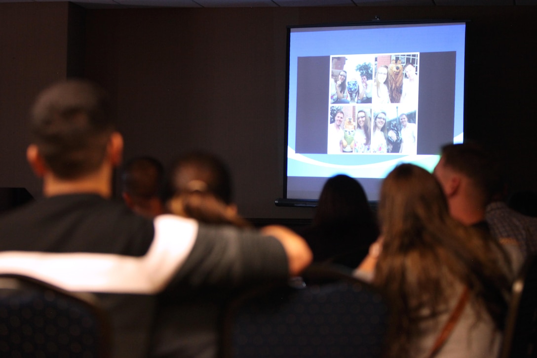 Couples watch a slideshow of the previous night’s outing during a Marriage Enrichment Retreat, hosted by 2nd Marine Aircraft Wing Chaplains in New Bern, N.C., Sept. 19, 2015. Forty couples took part in the two-day retreat to rekindle their bond with one another. Each couple participated in prescribed ice-breaking conversation techniques, seminars on communication and other couple-related cohesion-building activities. (U.S. Marine Corps photo by Lance Cpl. Jason Jimenez/Released)