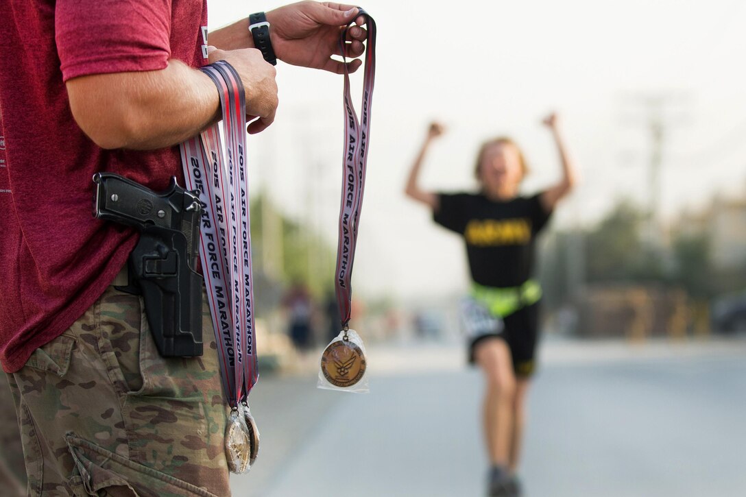 A U.S. soldier finishes the Air Force Half Marathon on Bagram Airfield, Afghanistan, Sept. 19, 2015. U.S. Air Force photo by Tech. Sgt. Joseph Swafford
