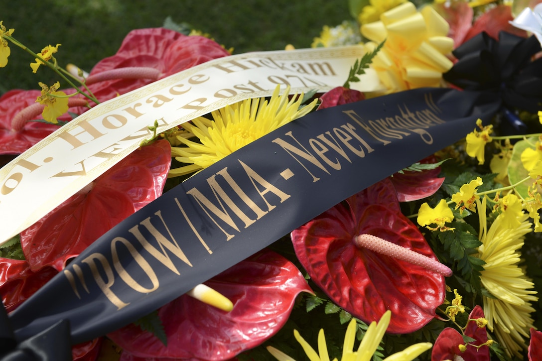 A flower arrangement from Veterans of Foreign Wars Post No. 970 lays ready to be presented during the National Prisoner of War/Missing in Action Recognition Day ceremony at the National Memorial Cemetery of the Pacific in Honolulu, Sept. 18, 2015. National POW/MIA Recognition Day serves as a day for the nation to reaffirm its commitment to recovering its missing and bringing them home. U.S. Army photo by Sgt. Richard DeWitt