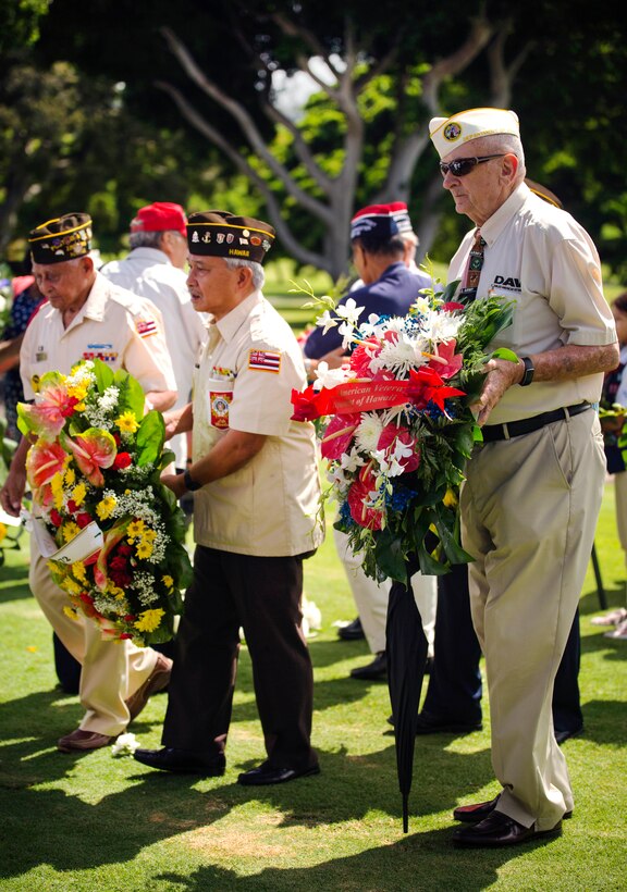 Veterans present wreaths in honor of prisoners of war and those missing in action during the National Prisoner of War/Missing in Action Recognition Day ceremony at the National Memorial Cemetery of the Pacific in Honolulu, Sept. 18, 2015. U.S. Marine Corps photo by Lance Cpl. Jonathan E. Lopez Cruet