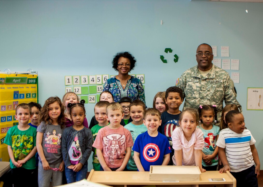 DLA Distribution commander Army Brig. Gen. Richard Dix reads “If You Give a Mouse a Cookie” to one of the classrooms at the Defense Distribution Center Susquehanna Child Development Center, in honor of Month of the Military Child on April 29.  