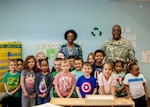 DLA Distribution commander Army Brig. Gen. Richard Dix reads “If You Give a Mouse a Cookie” to one of the classrooms at the Defense Distribution Center Susquehanna Child Development Center, in honor of Month of the Military Child on April 29.  