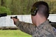 Second Lt. Tucker Sears, the 436th Logistics Readiness Squadron material management officer in charge, shoots a .22-caliber pistol during Team Camp March 24, 2015, at Fort Benning, Ga. At Team Camp, Sears earned a spot on the Air Force National Pistol Team and has already competed in two competitions and placed first on the Air Force’s Silver Team at the NRA National Outdoor Rifle and Pistol Championships at Camp Perry, Ohio. (U.S. Air Force photo/Lt. Col. Hugh M. Ragland)
