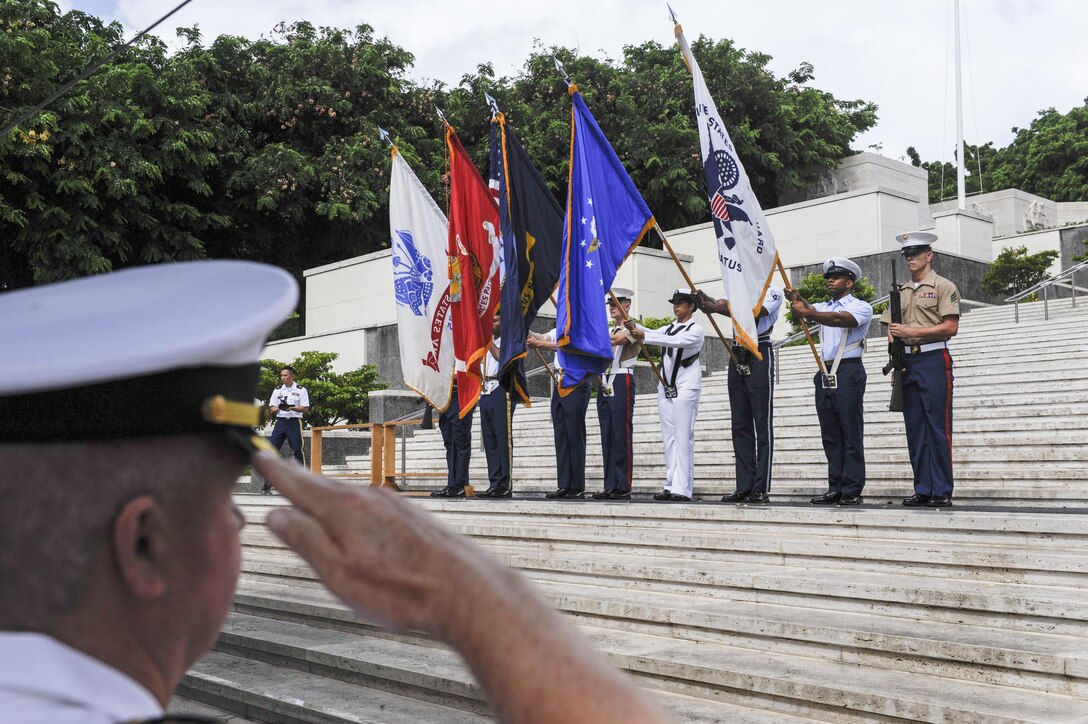 A  joint color guard presents the colors during the National Prisoner of War/Missing in Action Recognition Day ceremony at the National Memorial Cemetery of the Pacific in Honolulu, Sept. 18, 2015. U.S. Marine Corps photo by Cpl. John Tran