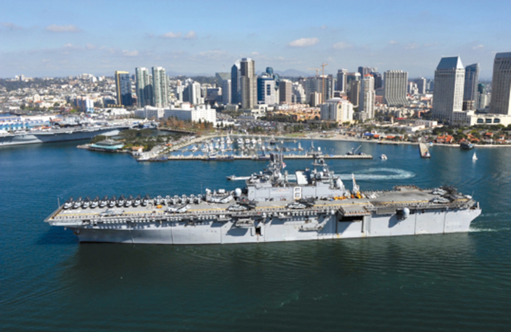 111114-N-KD852-121
SAN DIEGO (Nov. 14, 2011) The amphibious assault ship USS Makin Island (LHD 8) departs Naval Base San Diego on its first operational deployment to the western Pacific region. Makin Island is the Navy's newest amphibious assault ship and the only U.S. Navy ship with a hybrid-electric propulsion system. (U.S. Navy photo by Chief Mass Communication Specialist John Lill/Released)