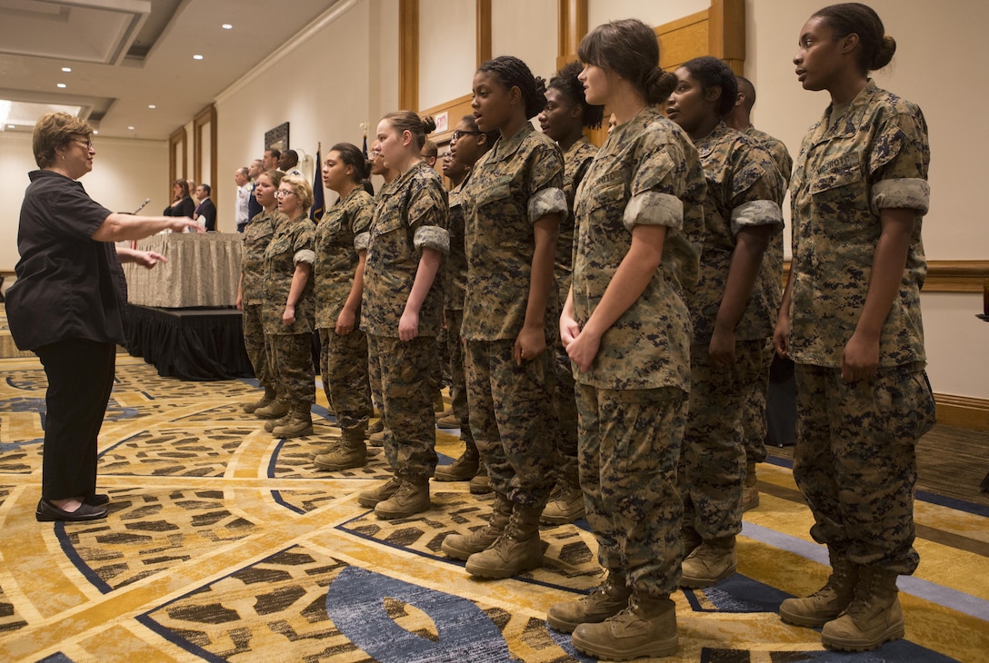 Students with the New Orleans Military and Maritime Academy Choir sing the national anthem at Military Appreciation Day 2015 in New Orleans, Sept. 18, 2015. The event was hosted by the Greater New Orleans Council of the Navy League of the United States to recognize the contributions of service members stationed in the New Orleans area. (U.S. Marine Corps photo by Cpl. Ian Leones/Released)