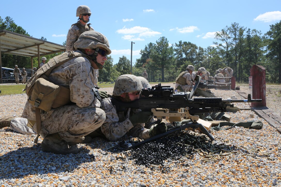 Marines from Battery M, 3rd Battalion, 14th Marine Regiment, 4th Marine Division, fire the M240 machine gun at targets down range at Pelham Range in Anniston, Alabama, on Sept. 19, 2015. The Marines attended training to hone skills and increase their proficiency in crew-served weapons systems.