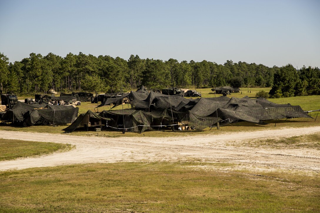 Marines and sailors with 10th Marine Regiment, 2nd Marine Division conducted a field exercise called Operation Firestorm in order to prepare for their upcoming exercise, Rolling Thunder, at Camp Lejeune, N.C., Sep. 14-18, 2015. The regiment set up their campground in a similar layout for Rolling Thunder in order to see how communications will be set up and functioning for the exercise. (U.S. Marine Corps photo by Cpl. Krista James/Released)