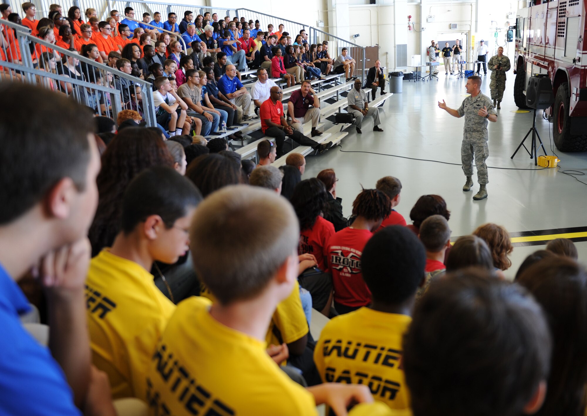Col. Frank Amodeo, 403rd Wing commander, delivers welcoming remarks to high school students during the STEM (science, technology, engineering and mathematics) Diversity Outreach Day Sept. 18, 2015, at the fuel cell hangar, Keesler Air Force Base, Miss. The event consisted of 10 Mississippi gulf coast high school Junior ROTC units and science students viewing a staged crime scene, participating in a “brainiacs” test and visiting informative booths about Air Force opportunities and accession requirements with an emphasis on STEM. (U.S. Air Force photo by Kemberly Groue)