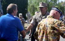 Major Gen. Daniel J. O’ Donohue is congratulated by guests during the change of command ceremony in which he assumed command of 1st Marine Division aboard Marine Corps Base Camp Pendleton, Calif., Sept. 10, 2015. O’Donohue is taking command of the division after recently commanding Marine Corps Forces Cyberspace Command. (U.S. Marine Corps photo by Staff Sgt. Bobbie A. Curtis)