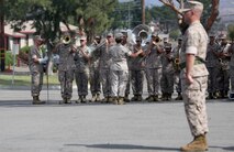 Members of the 1st Marine Division Band perform during the change of command ceremony in which Brig. Gen. Daniel D. Yoo passed command of the 1st Marine Division to Maj. Gen. Daniel J. O’Donohue at a ceremony aboard Marine Corps Base Camp Pendleton, Calif., Sept. 10, 2015. O’Donohue is taking command of the division after recently commanding Marine Corps Forces Cyberspace Command. (U.S. Marine Corps photo by Staff Sgt. Bobbie A. Curtis)