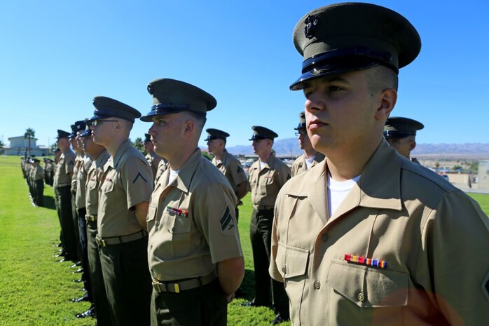 Marines with 3rd Battalion, 4th Marines, 7th Marine Regiment, 1st Marine Division stand at parade rest during the 3/4 reactivation ceremony aboard Marine Air Ground Combat Center Twentynine Palms, Calif., Sept. 17, 2015. The Marine Corps’ reactivation of the “Thundering Third” officially starts Oct. 1, 2015, which marks exactly 90 years of dedicated service to the Corps.