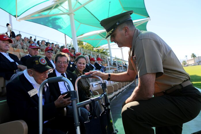 Major General Daniel J. O’Donohue, commanding general of 1st Marine Division, pays respect to Sgt. Maj. Ray V. Willburn (Ret) during the 3rd Battalion, 4th Marines, 7th Marine Regiment, 1st Marine Division reactivation ceremony aboard Marine Air Ground Combat Center Twentynine Palms, Calif., Sept. 17, 2015. The Marine Corps’ reactivation of the “Thundering Third” officially starts Oct. 1, 2015, which marks exactly 90 years of dedicated service within the Corps.