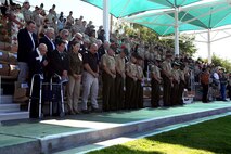 Marines with 3rd Battalion, 4th Marines, 7th Marine Regiment, 1st Marine Division and Marine Corps veterans pray during the 3/4  reactivation ceremony aboard Marine Air Ground Combat Center Twentynine Palms, Calif., Sept. 17, 2015. The Marine Corps’ reactivation of the “Thundering Third” officially starts Oct. 1, 2015, which marks exactly 90 years of dedicated service within the Corps.