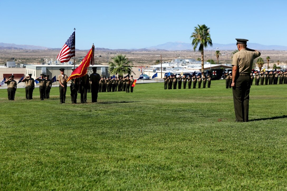 Lieutenant Colonel Brian S. Middleton, commanding officer of 3rd Battalion, 4th Marines, 7th Marine Regiment, 1st Marine Division, salutes the colors during the unit’s reactivation ceremony aboard Marine Air Ground Combat Center Twentynine Palms, Calif., Sept. 17, 2015. The Marine Corps’ reactivation of the “Thundering Third” officially starts Oct. 1, 2015, which marks exactly 90 years of dedicated service within the Corps.