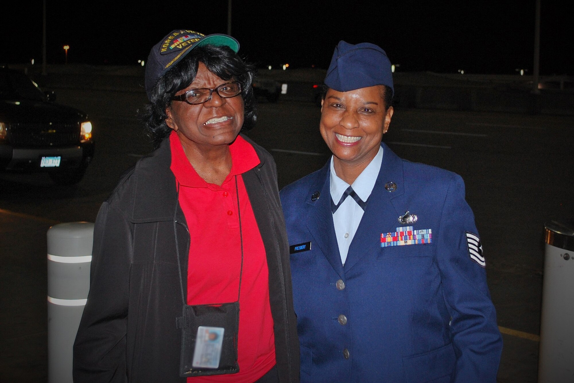 Retired U.S. Army Lt. Col. Martha Baker who served from 1941-1961 stands with Tech. Sgt. Kimberly Presbery, Air Reserve Personnel Center casualties service team technician, during an Honor Flight Network event Sept. 19, 2015, at the Denver International Airport in Denver. (U.S. Air Force courtesy photo) 