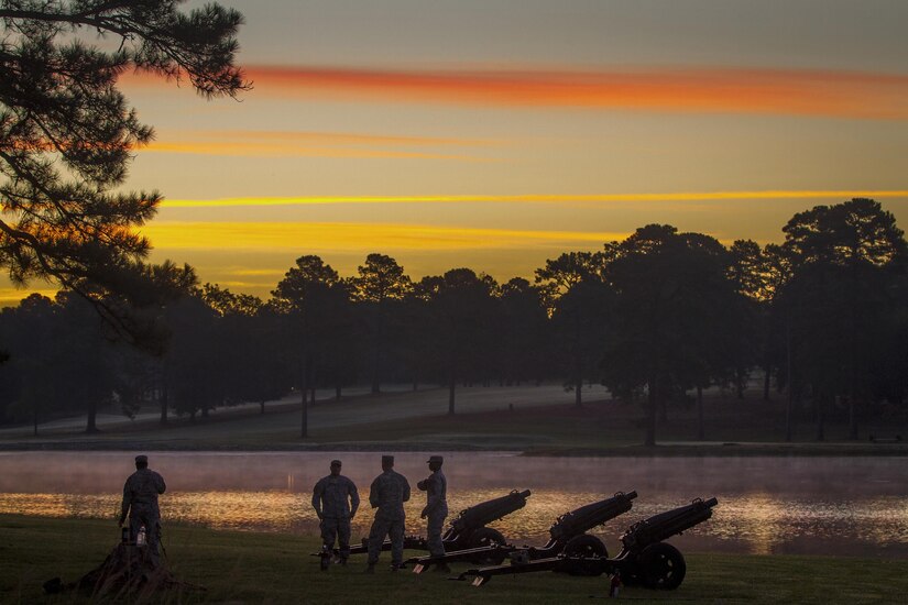 Soldiers prepare three M116 pack howitzers, the oldest of which was commissioned in 1938, for a change of command ceremony for the Army Reserve’s 108th Training Command as the sun rises at Fort Jackson, S.C., Sept. 19, 2015. The soldiers are assigned to Troops Battalion Salute Battery, 171st Brigade. The M116's are called “pack” howitzers because they were originally pulled by pack animals. U.S. Army photo by Sgt. Ken Scar