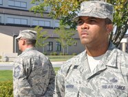 Senior Master Sgts. Anthony Harris (foreground), 512th Force Support Squadron, and James McGarvey, 512th Civil Engineer Squadron, stand in vigil around the base flag
pole as part of POW/MIA Recognition Day Sept.18, 2015, at Dover Air Force Base, Del. Local ceremonies were held throughout the country and around the world at military installations, places of worship, ships at sea, schools, national veteran organizations, civil and municipal areas. (U.S. Air Force photo/Staff Sgt. Joe Yanik)
