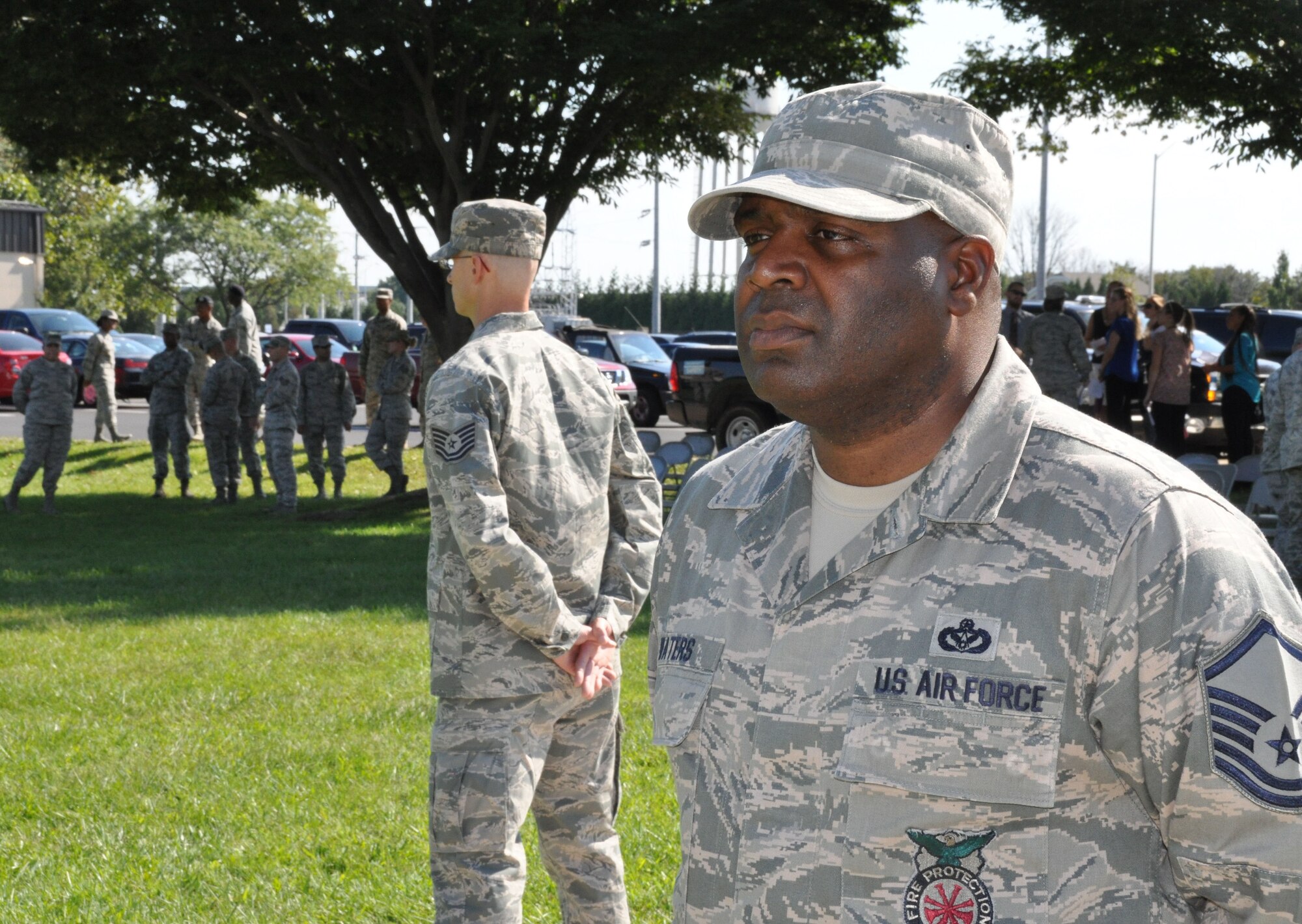 Master Sgt. Curtis Waters (right), 512th Civil Engineer Squadron, and Tech. Sgt. Sean McGahuey, 512th Force Support Squadron, stand in vigil around the base flag pole as part of POW/MIA Recognition Day Sept.18, 2015, at Dover Air Force Base, Del. The 18th marked the last day of 2015 POW/MIA Recognition Week, a time when Americans all across the country remembered the nation's past and present prisoners of war and missing in action. (U.S. Air Force photo/Staff Sgt. Joe Yanik)
